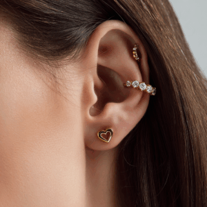 Piercings tendencias dos perforaciones en lóbulo